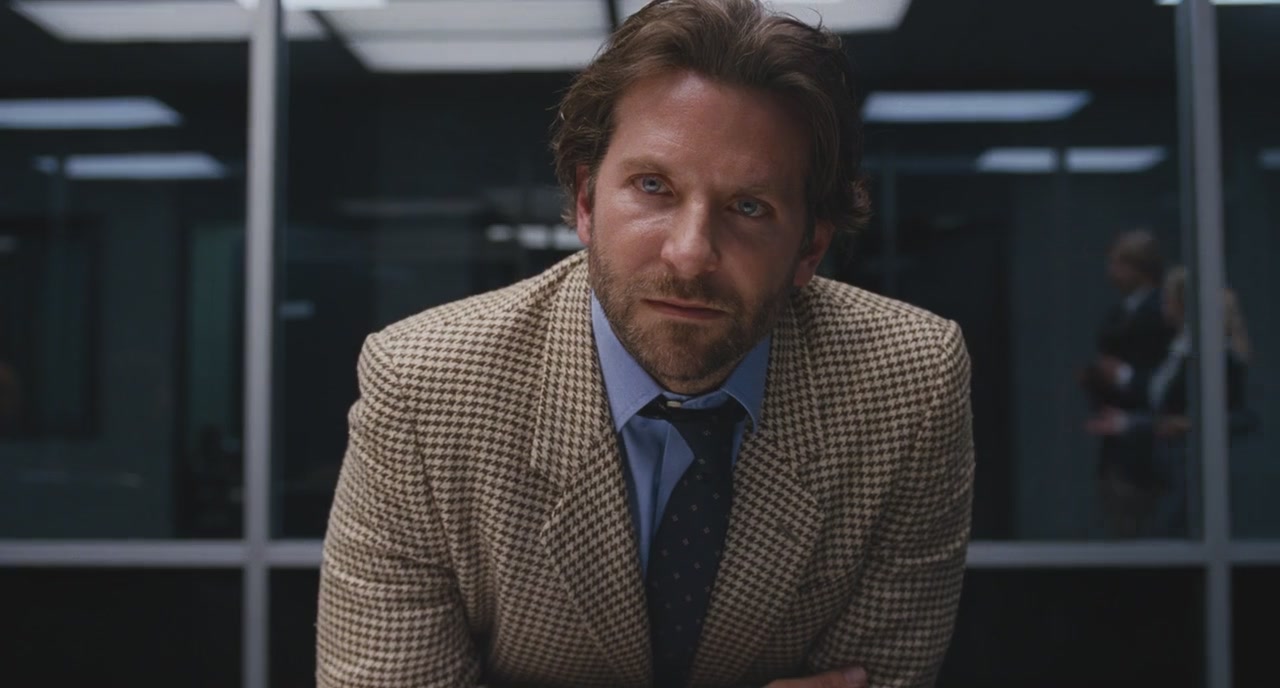 Bradley Cooper em cena como Neil Walker em Joy - O Nome do Sucesso. (Reprodução)