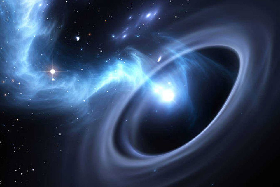 Astrônomos descobrem buraco negro gigante aprisionando 6 galáxias