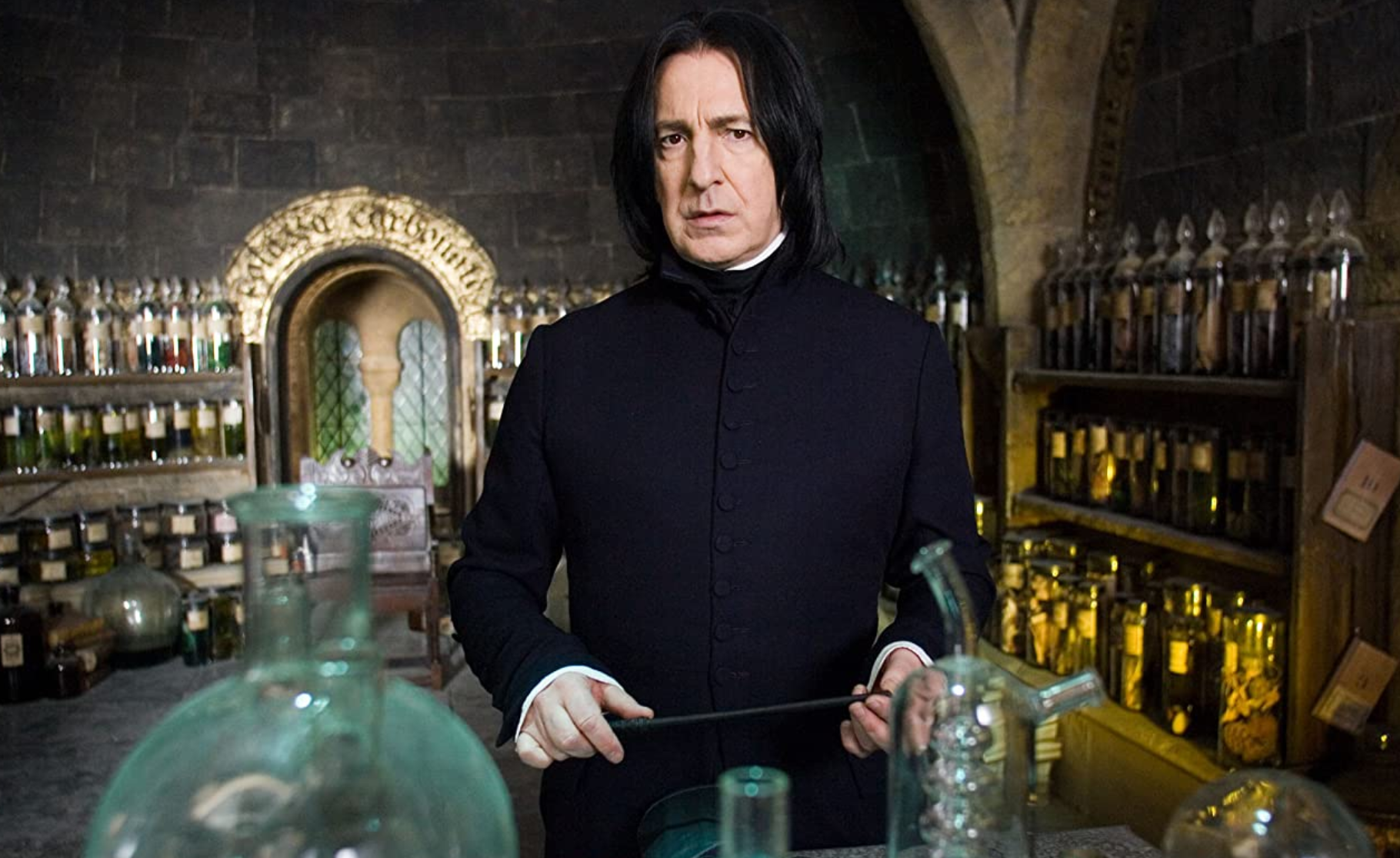 Alan Rickman as Severus Snape.
