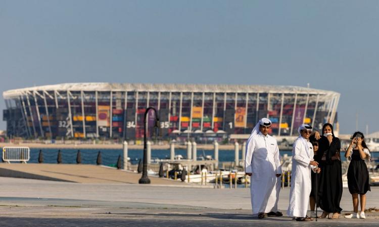 In Qatar, men wear thobe and women wear abaya