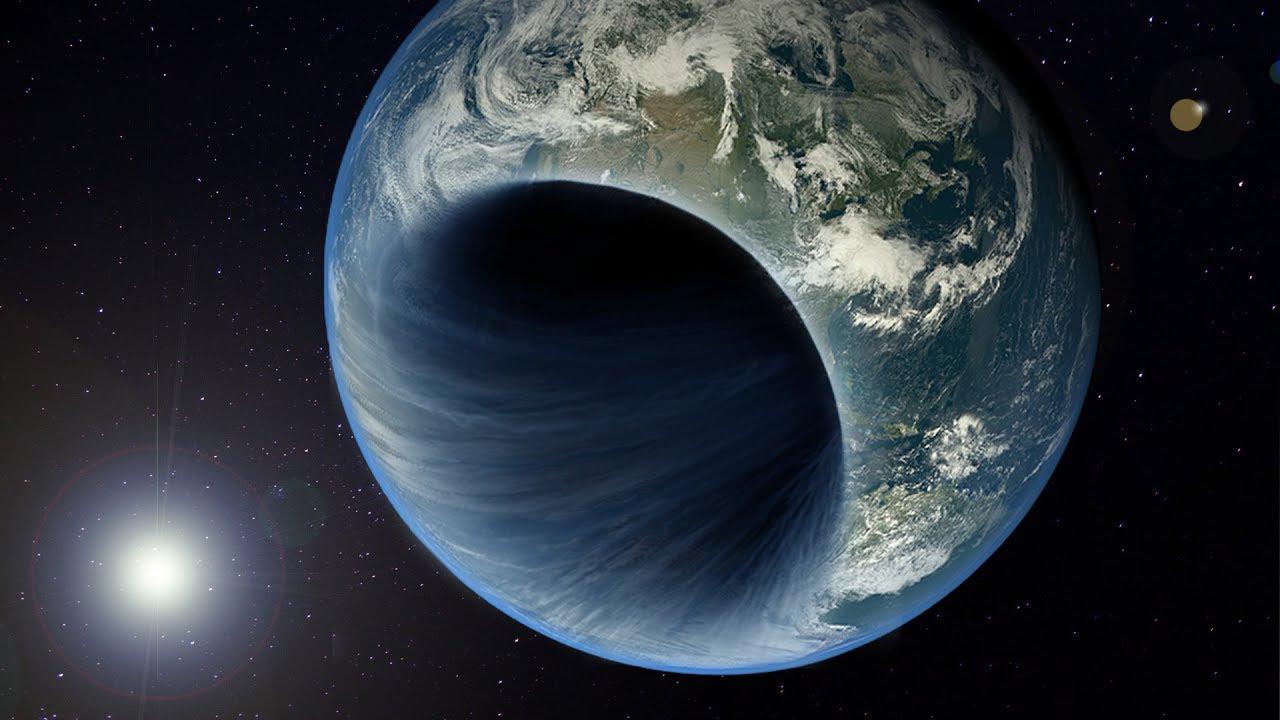 Artist's depiction of Earth turning into a black hole.