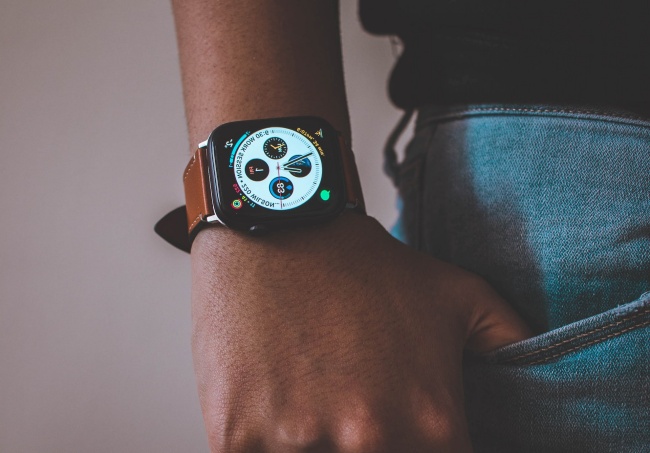 Both devices display the weather forecast and can be customized with different watch faces.