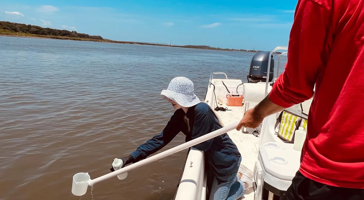 A team of researchers from the University of Florida collecting DNA samples from the area's waters.