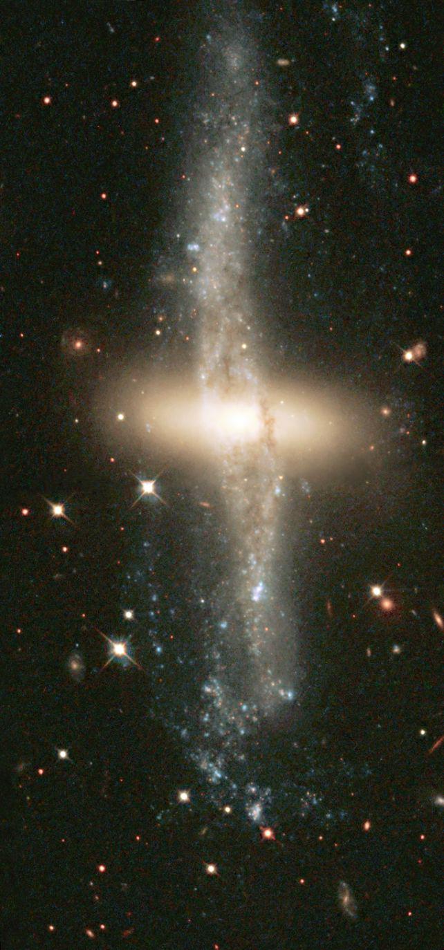 Polar ring galaxy NGC 4650A is the fuzzy blob in the middle.