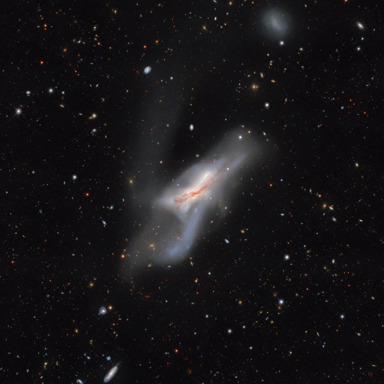 Collision of two galaxies (NGC 520) that occurred more than 300 million years ago.