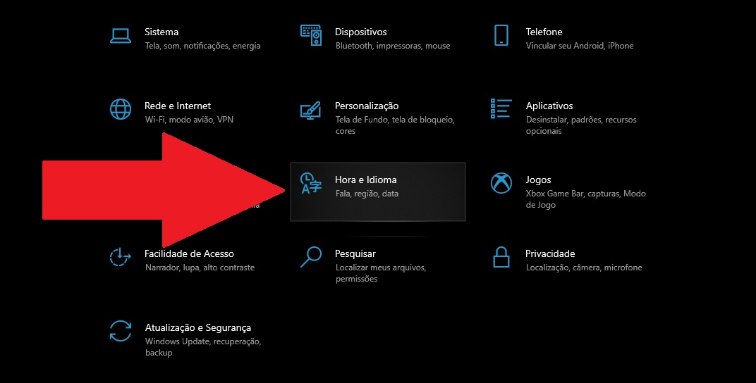 Selecione a opção "Hora e Idioma" para começar o processo de mudança de região do seu sistema.