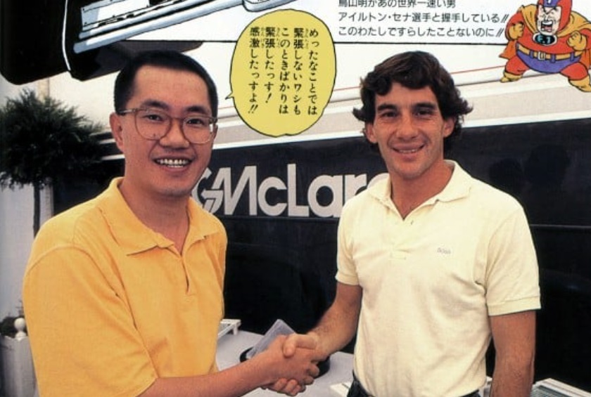 Toriyama ao lado de Ayrton Senna no começo da década de 1990.