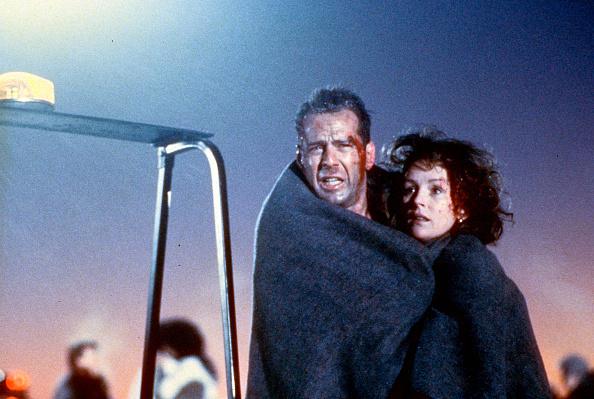 Bonnie Bedelia e Bruce Willis em cena de Duro de Matar. (Fonte: Getty Images)